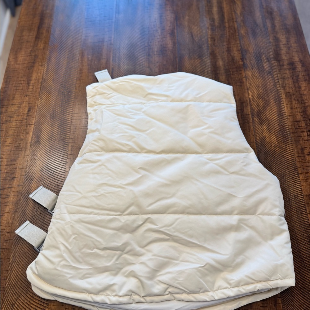 Roller Coaster Puffer Vest" in Off White from the brand Fashion Nova. - Picture 9 of 10